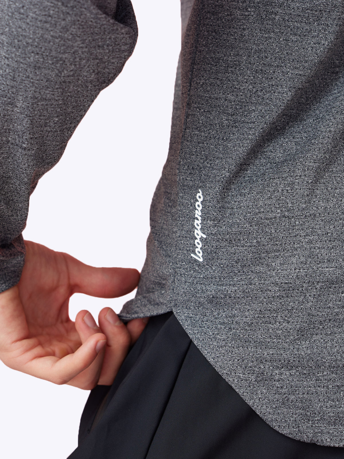 Detailed view of the Seamfinity Long Sleeve's subtle texture in Charcoal, emphasizing luxury touch||||Charcoal