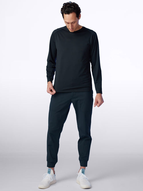 Model dons Loogaroo Seamfinity Long Sleeve in Onyx, front view highlighting the sophisticated black hue