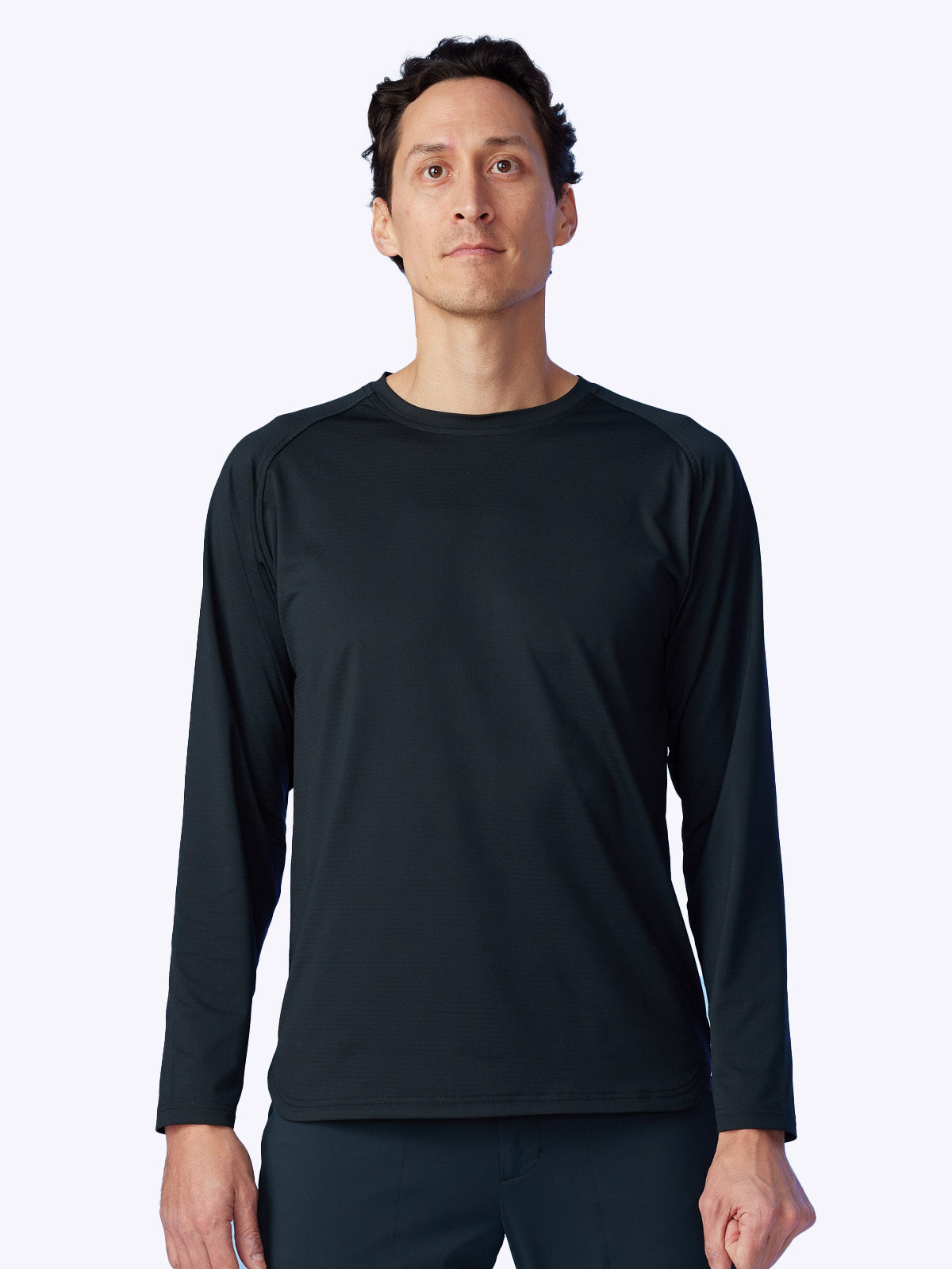 Close-up detailing the subtle, luxurious texture of the Seamfinity Long Sleeve Shirt in Onyx.||||Onyx
