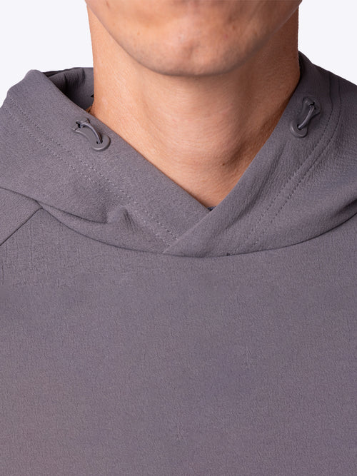 Close-up of the collar and drawstring on a Charcoal MoonWeave Hoodie by Loogaroo