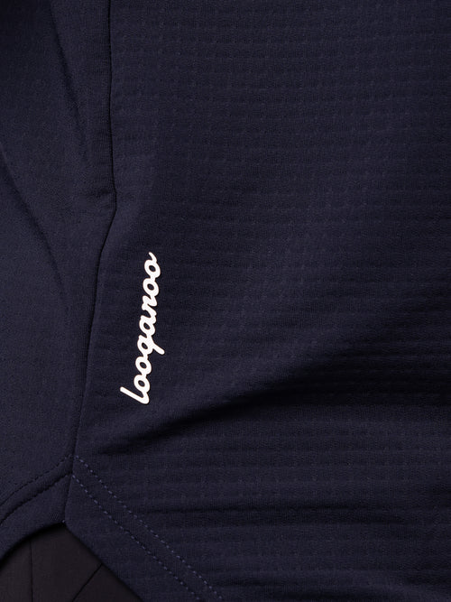 Close-up of the dimpled textured fabric on a lightweight men’s Nexa Hoodie in Oceana Navy by Loogaroo