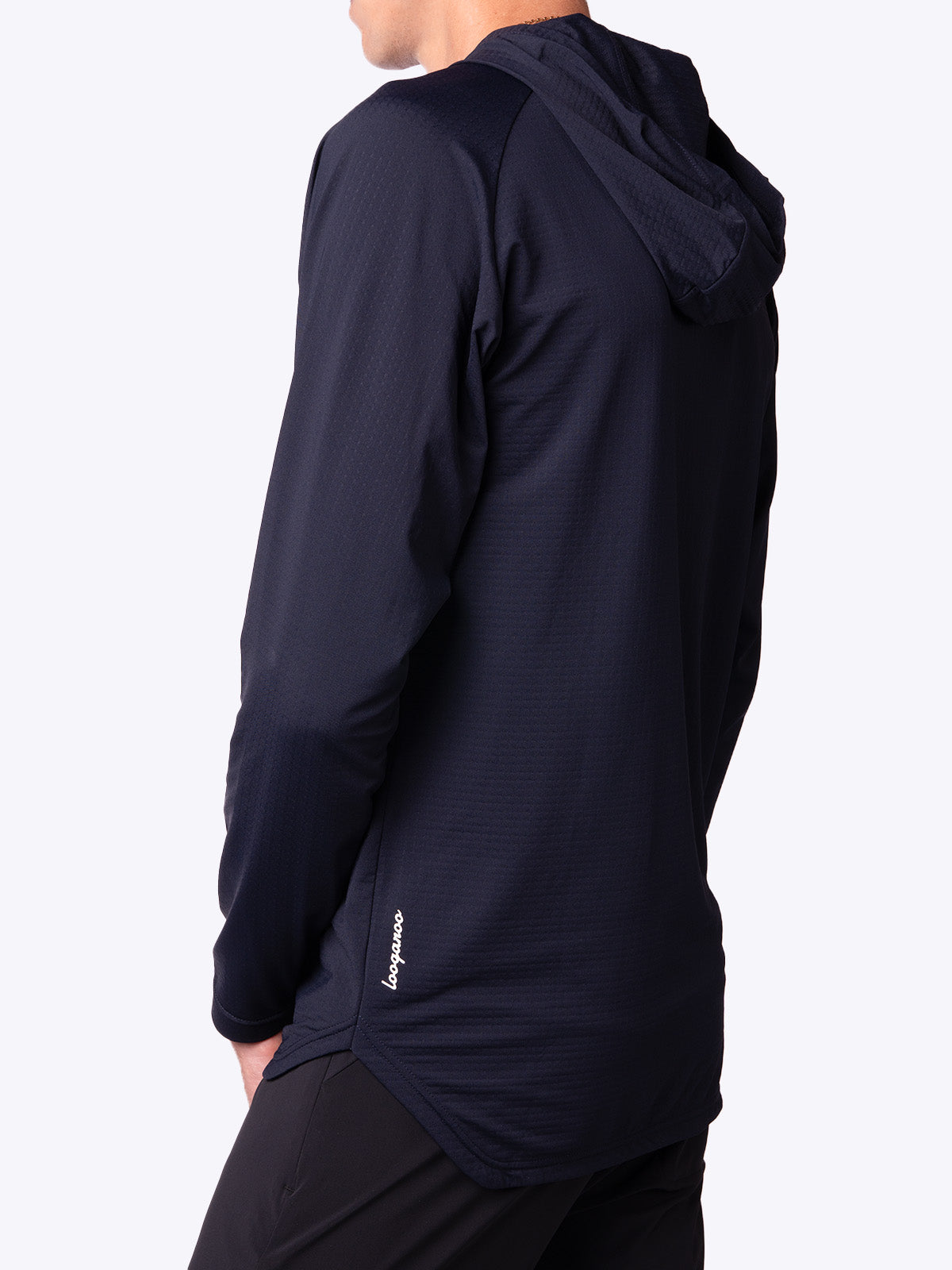 Side back view of a model wearing a lightweight men’s Nexa Hoodie in Oceana Navy by Loogaroo||||Oceana