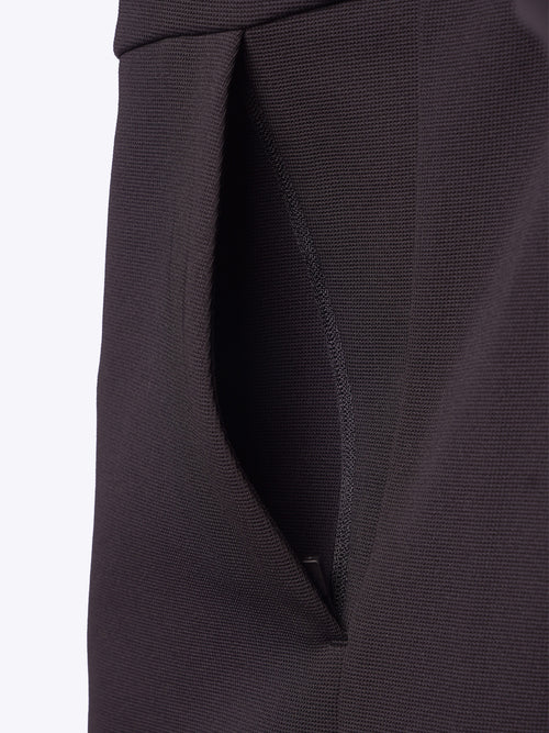 Close-up of the zippered front pockets on a RangeRoamer Jacket in Onyx Black by Loogaroo